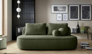 Mooda Calvin vihreä 3-istuttava vuodesohva pyöristetyllä muotoilulla ja koristepyöreillä tyynyillä modernissa olohuoneessa – kompakti ja tyylikäs ratkaisu