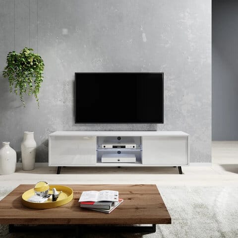 Valkoinen Vipan TV-taso 140 cm, moderni muotoilu ja kiiltävä pinta harmaata betoniseinää vasten