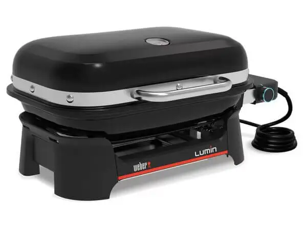Weber Lumin Compact sähkögrilli mustana pöydällä käytettävä sähkögrilli.